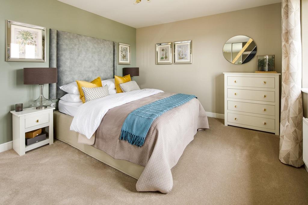 Bedroom 2 offers space for a double bed and...