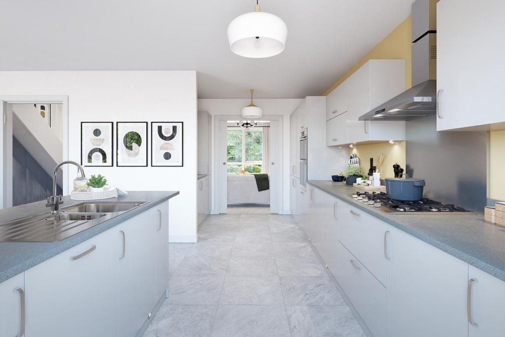 A modern kitchen area with ample storage