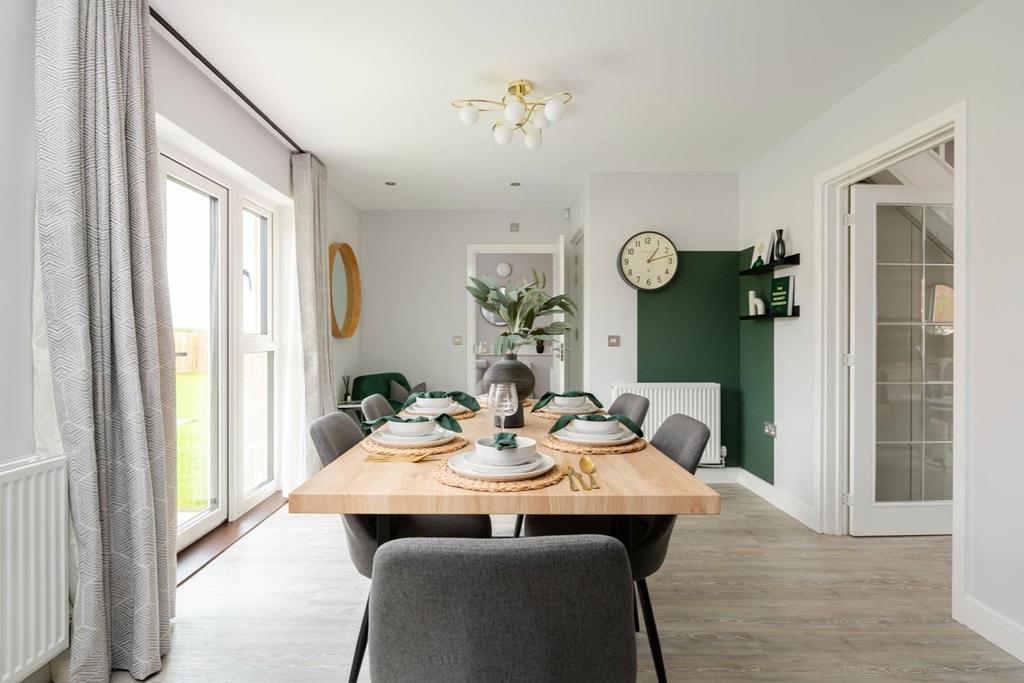 A modern kitchen &amp; dining area with ample storage