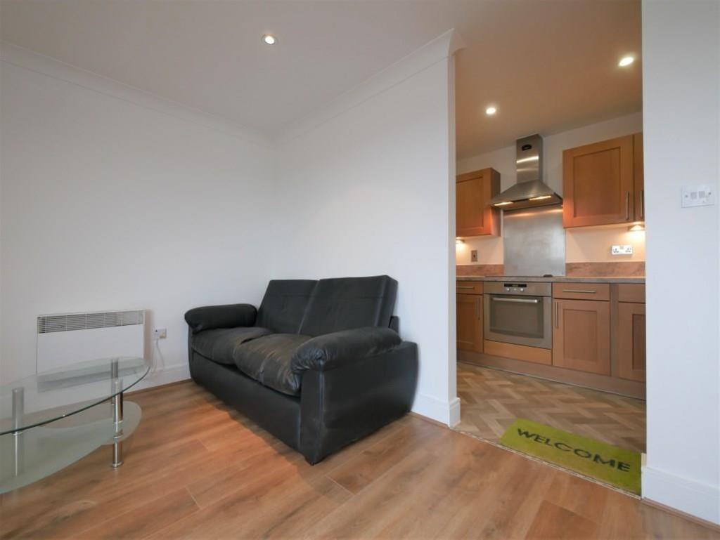 Lounge area through to kitchen