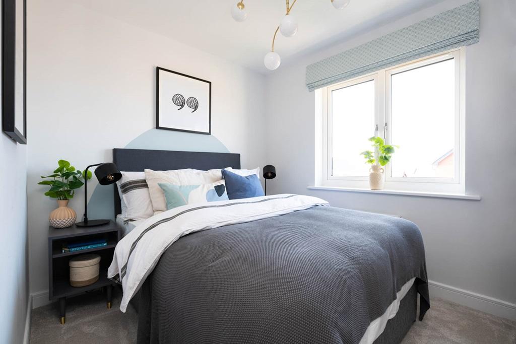 Light filled bedroom   typical Taylor Wimpey home