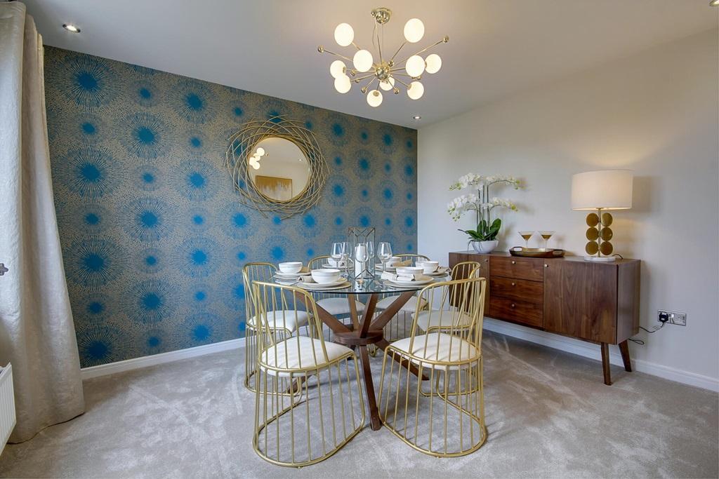 The dining area provides an inviting space to...