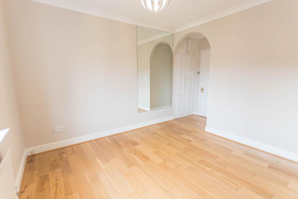 Bedroom 2 with wardrobes