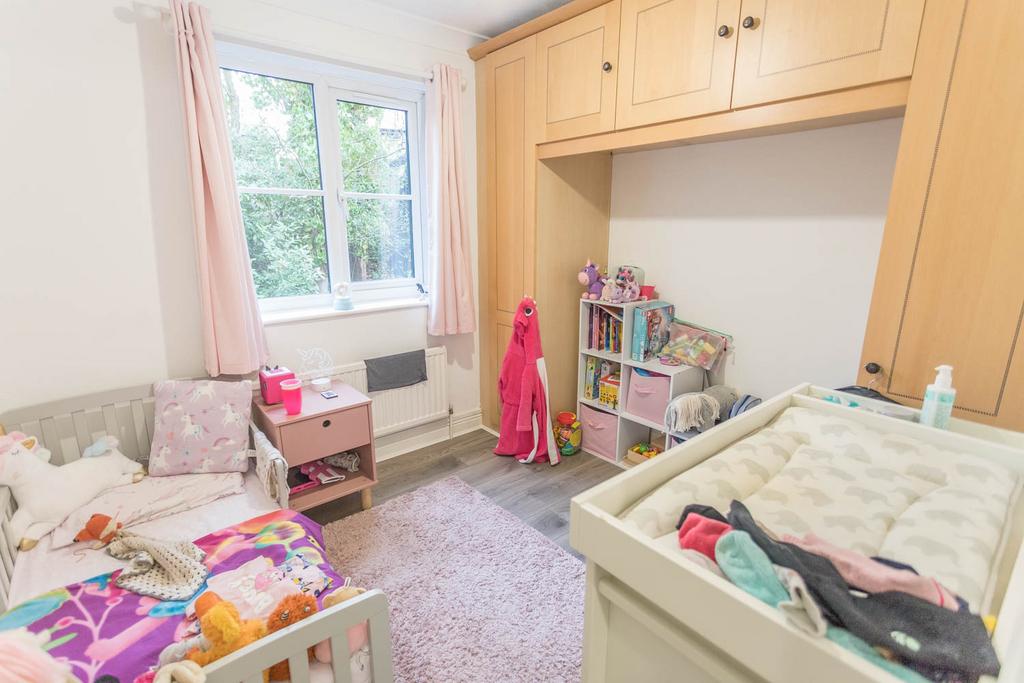 Bedroom 2 with wardrobes