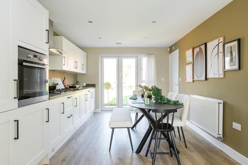 Long kitchen leading to the garden