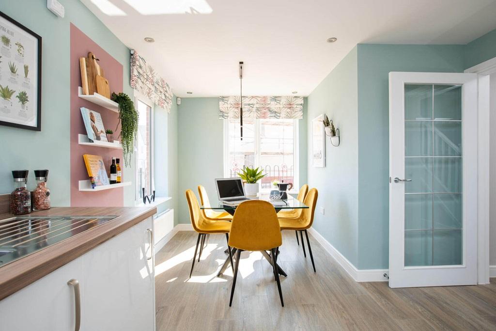 The open plan kitchen and dining area also...