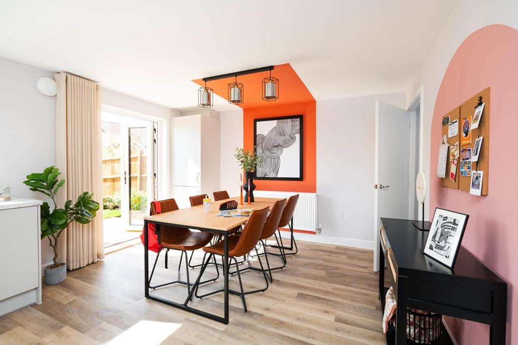 Double doors lead from the dining area to the...