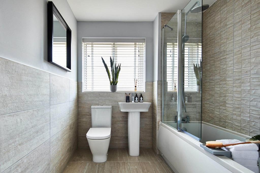 A family bathroom completes the home