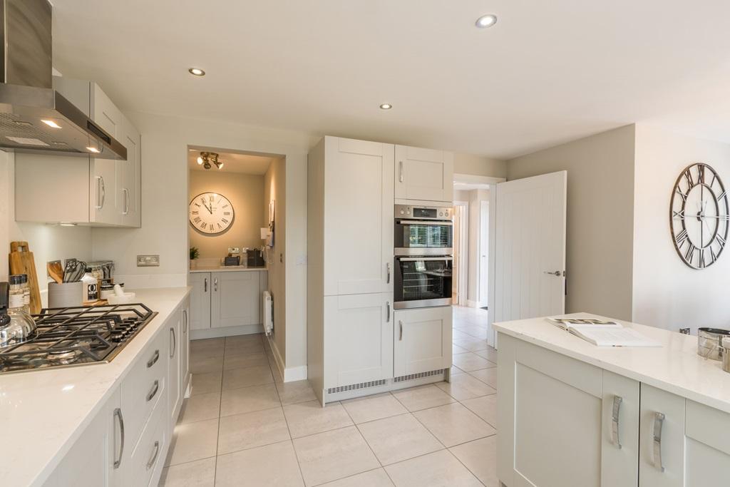 Kitchen with useful utility room for laundry