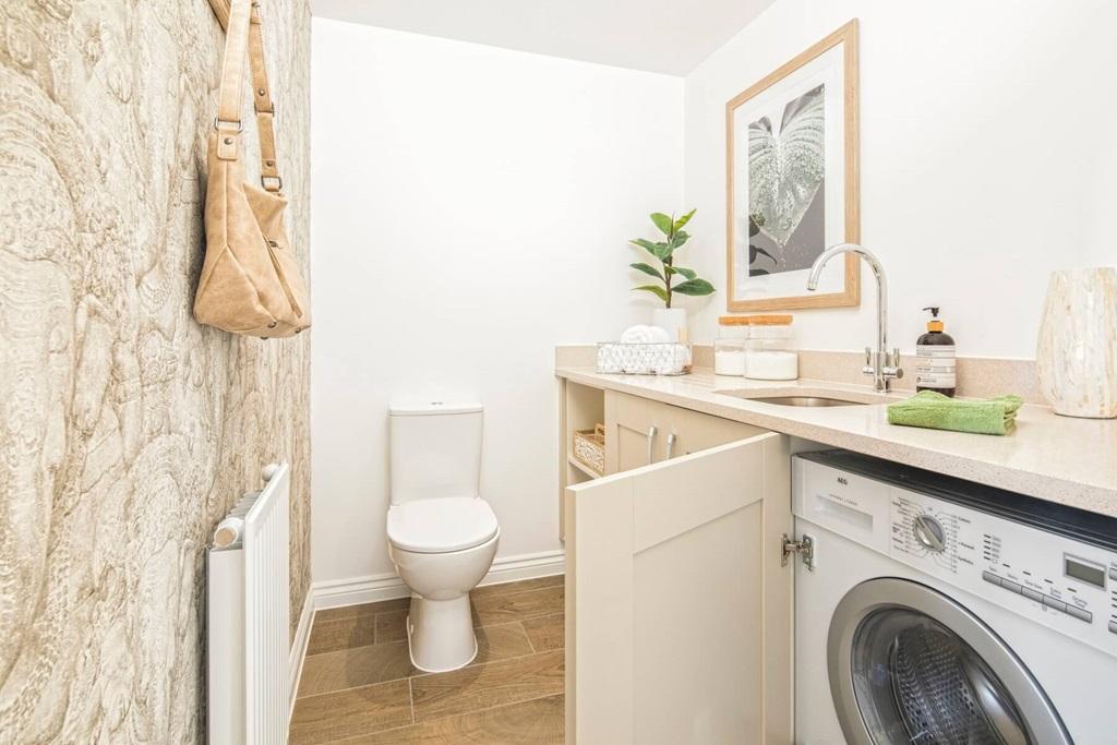 Handy cloakroom and utility room with laundry...