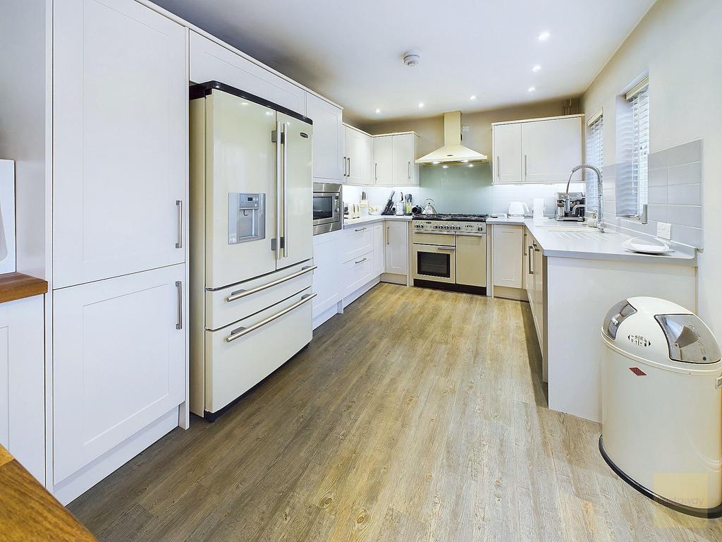 Kitchen with range cooker and integrated...