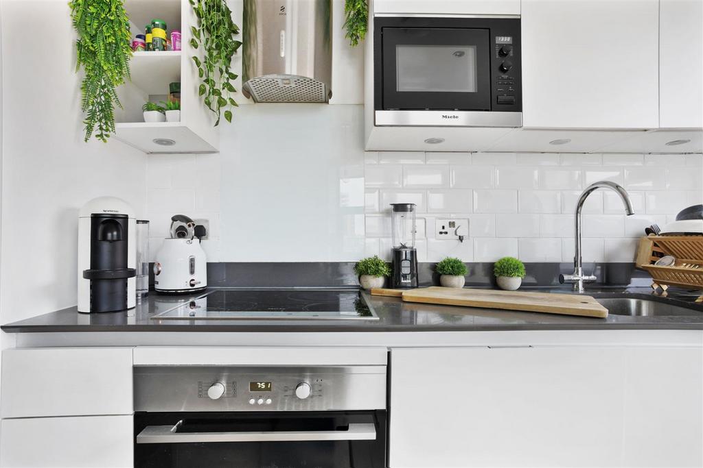 Reception/Kitchen/Dining Area