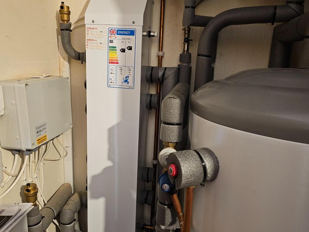 An air source heat pump (ASHP)