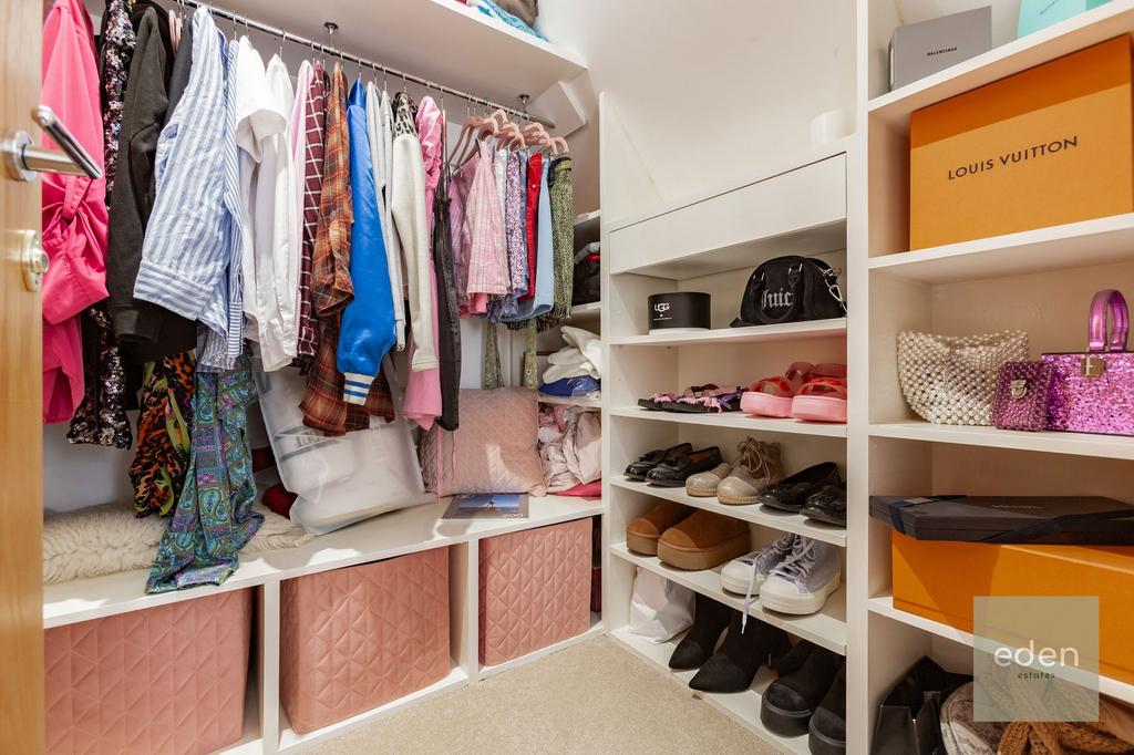 Bedroom with walk in wardrobe