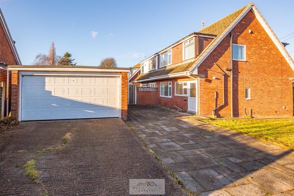 Back of house with garage