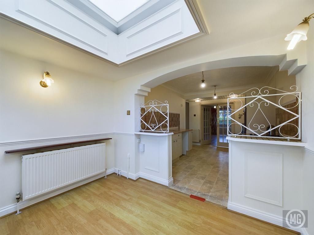 Dining Area leading into Kitchen