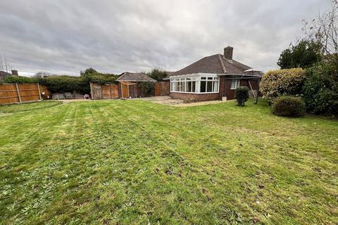 2 bedroom detached bungalow to rent, Heathy Close, Barton On Sea, New Milton, Hampshire. BH25 7JP