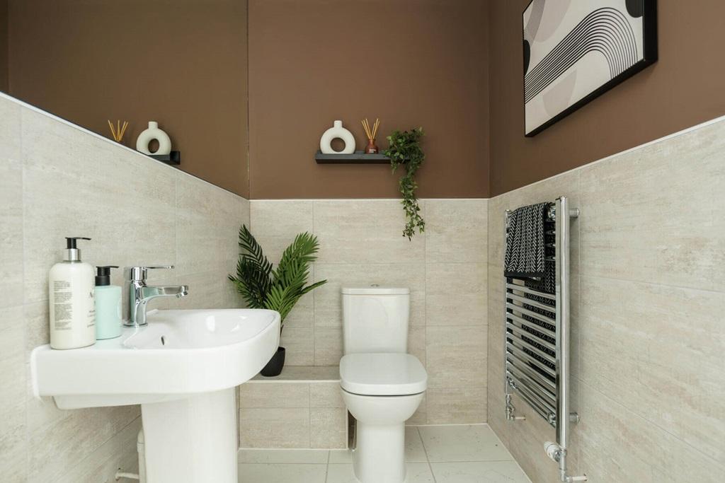 A guest cloakroom completes the ground floor