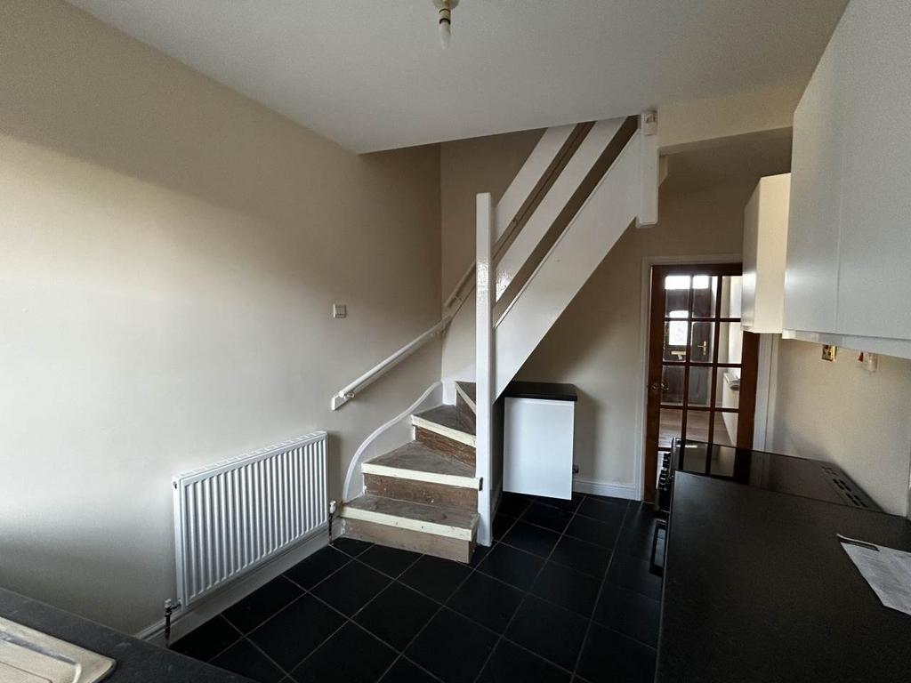 Kitchen with stairs