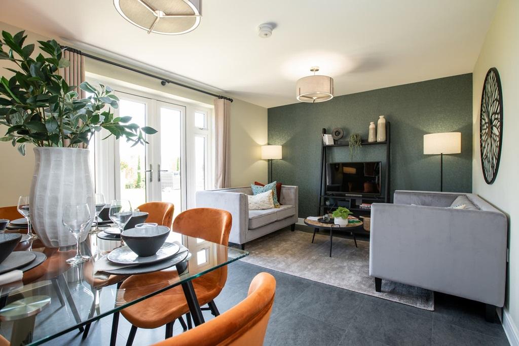 A bright and airy living room with French doors...