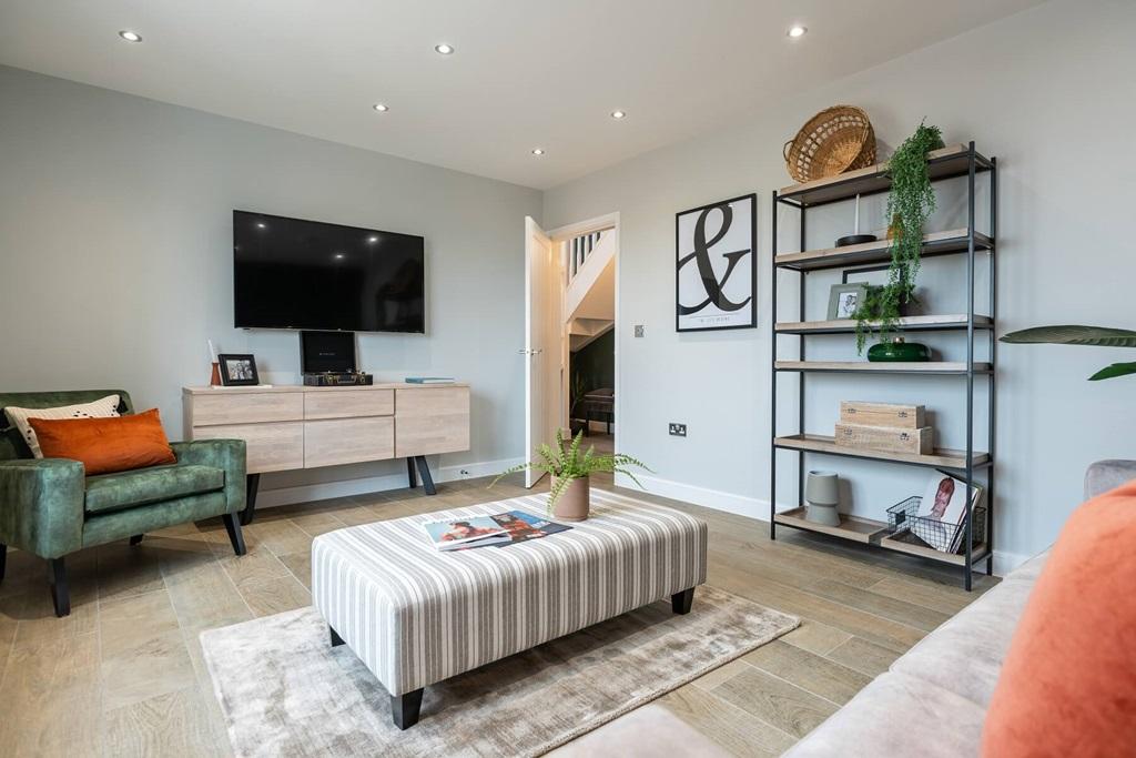 A blank canvas living room featuring a balcony