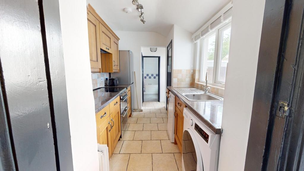 A bright and clean kitchenette featuring modern...