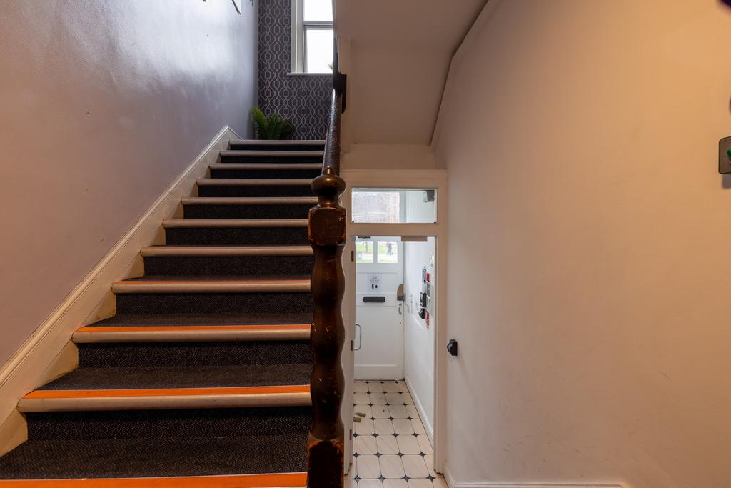 A clean and well maintained staircase leading t...