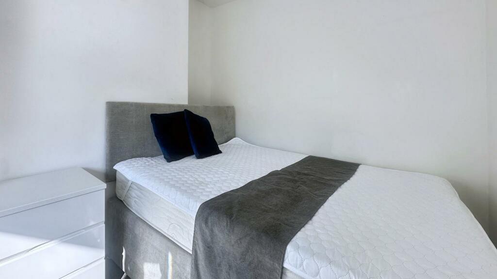 A bright and inviting double bedroom, perfect f...