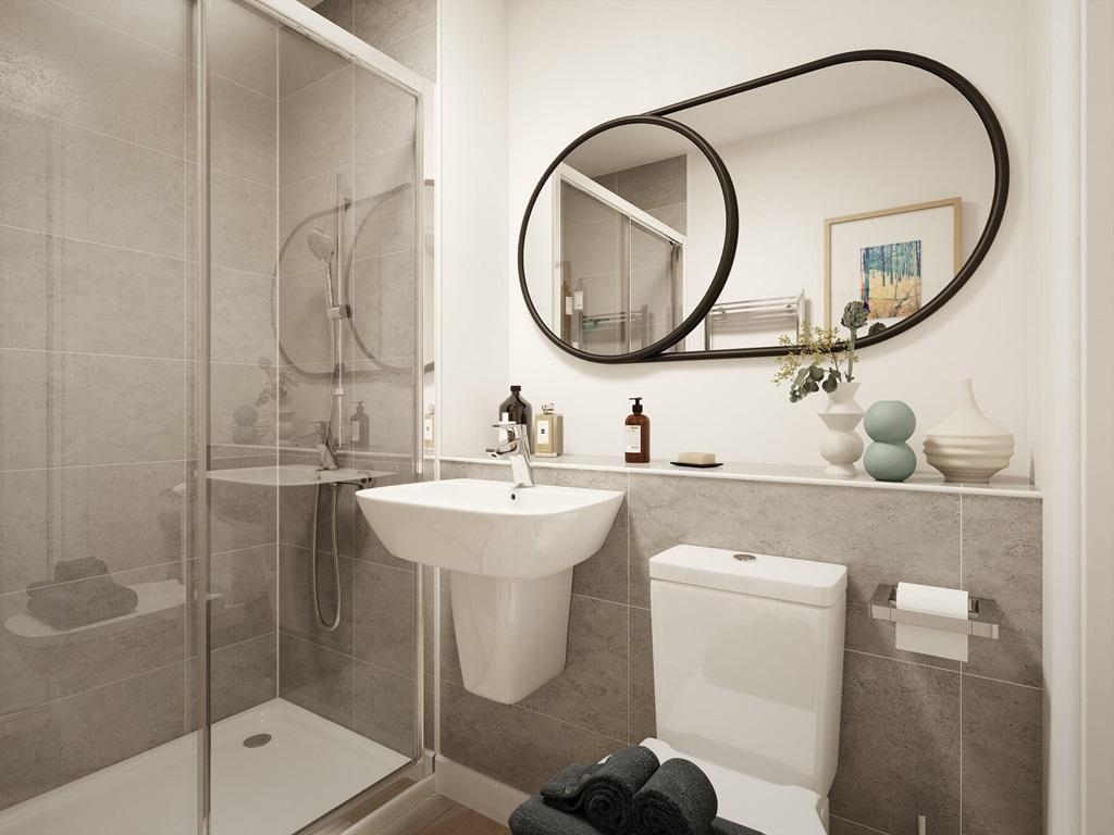 The en suite with high quality fixtures and...