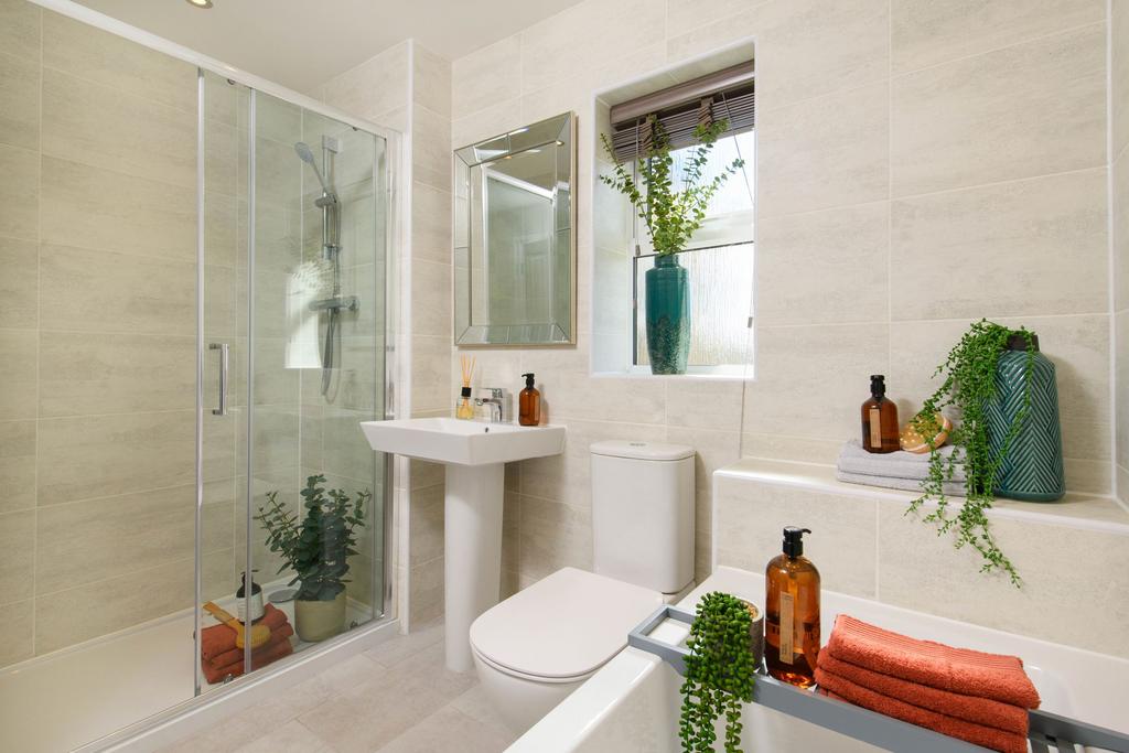 Modern family bathroom in Avondale style home...