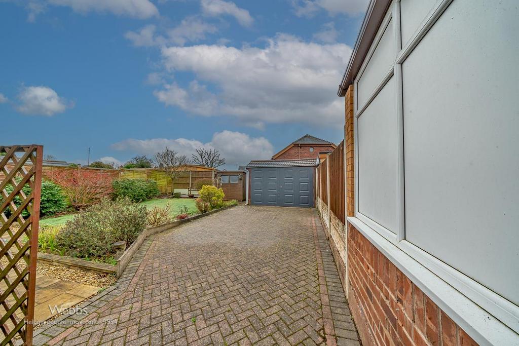 Rear driveway and garage