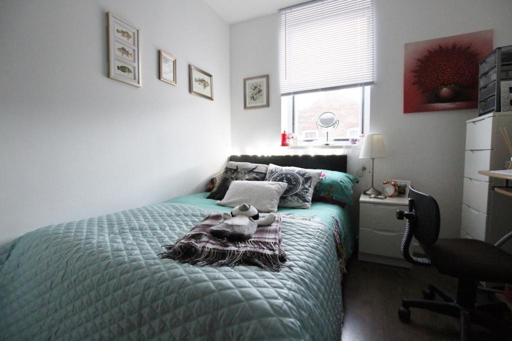 A cozy and well decorated double bedroom, perfe...