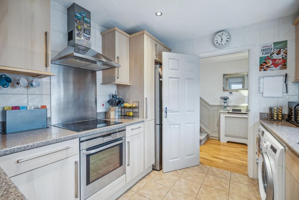 Kitchen showing hallway