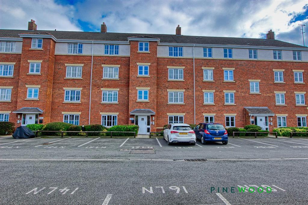 Rear of block and parking space