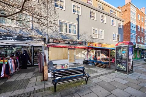 Retail property (high street) to rent, Roman Road, London