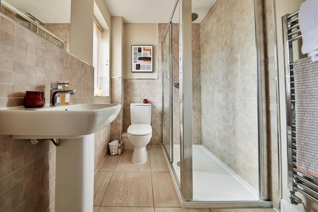 An en suite shower room away from the family