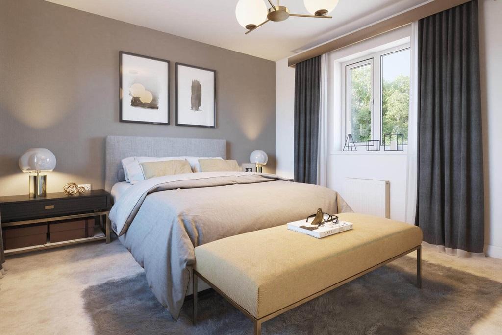 A main bedroom hosts an en suite, creating a...