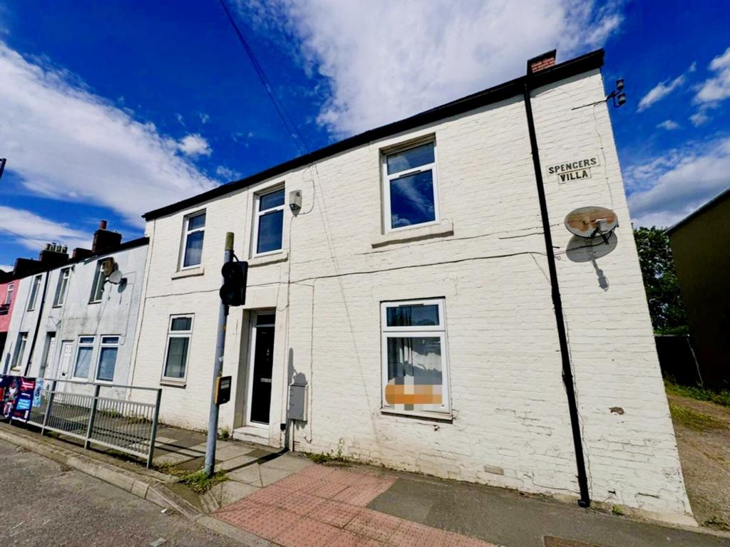 A charming and well-maintained exterior of the ...