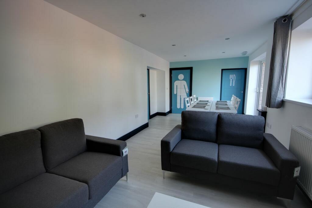 A spacious and modern living room perfect for s...