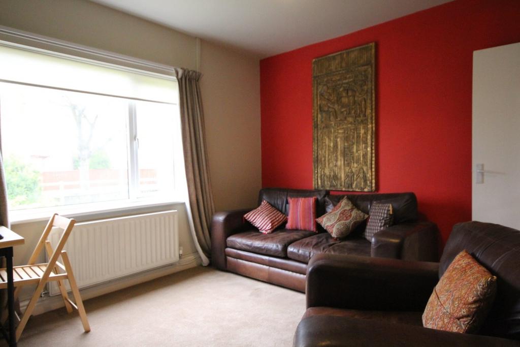 A spacious and inviting modern living room with...
