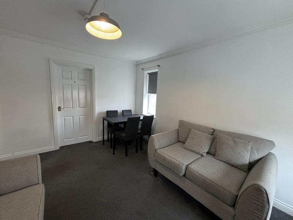 A spacious and inviting living room perfect for...