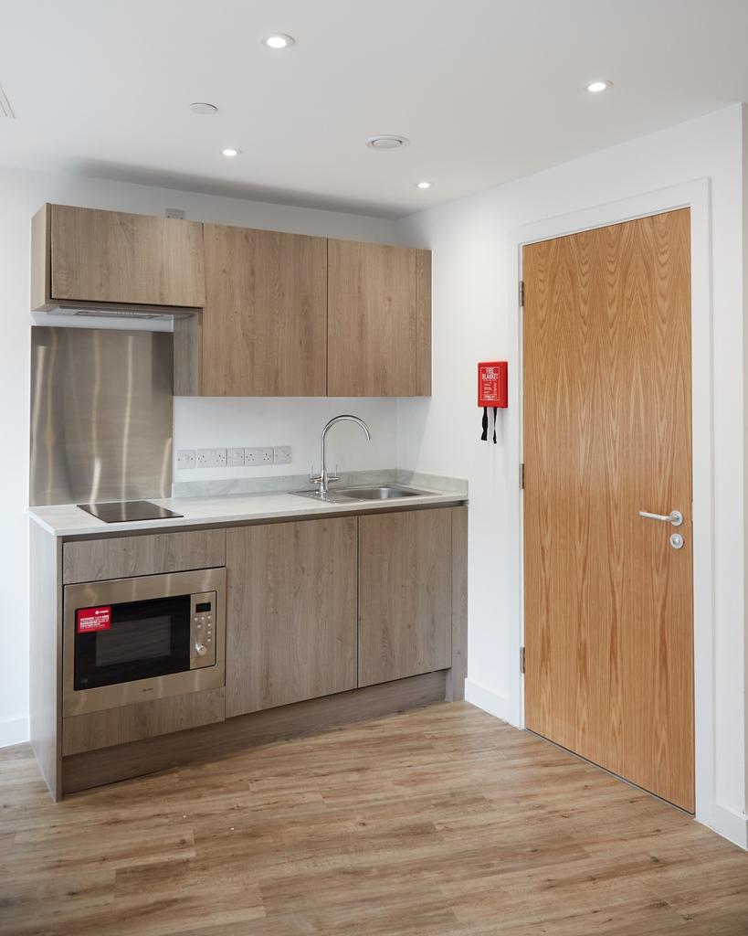 A modern and well equipped kitchenette perfect ...