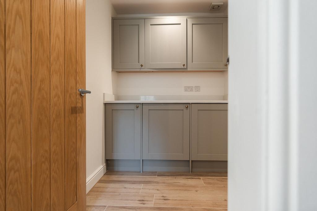 Utility room with washing machine &amp; dryer
