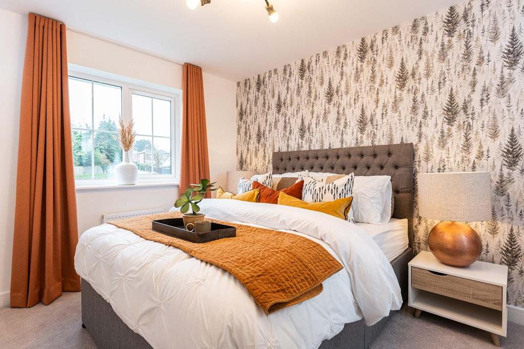 Escape to the main bedroom which overlooks the...