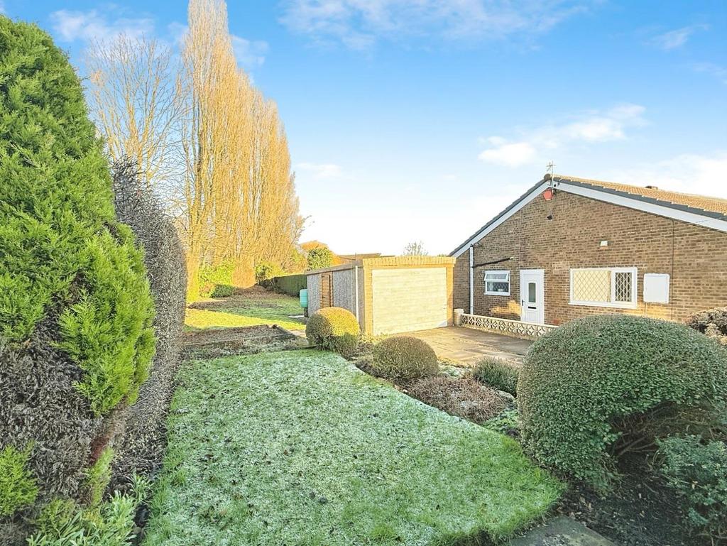 Rear garden + garage