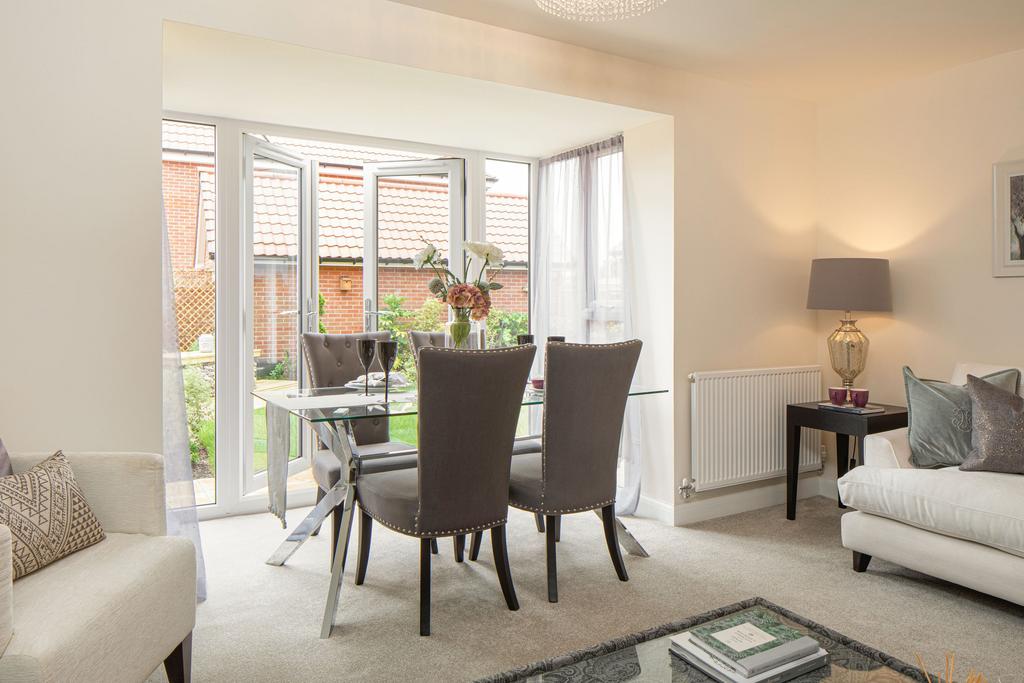 Open plan lounge in the Woodcote 4 bedroom home