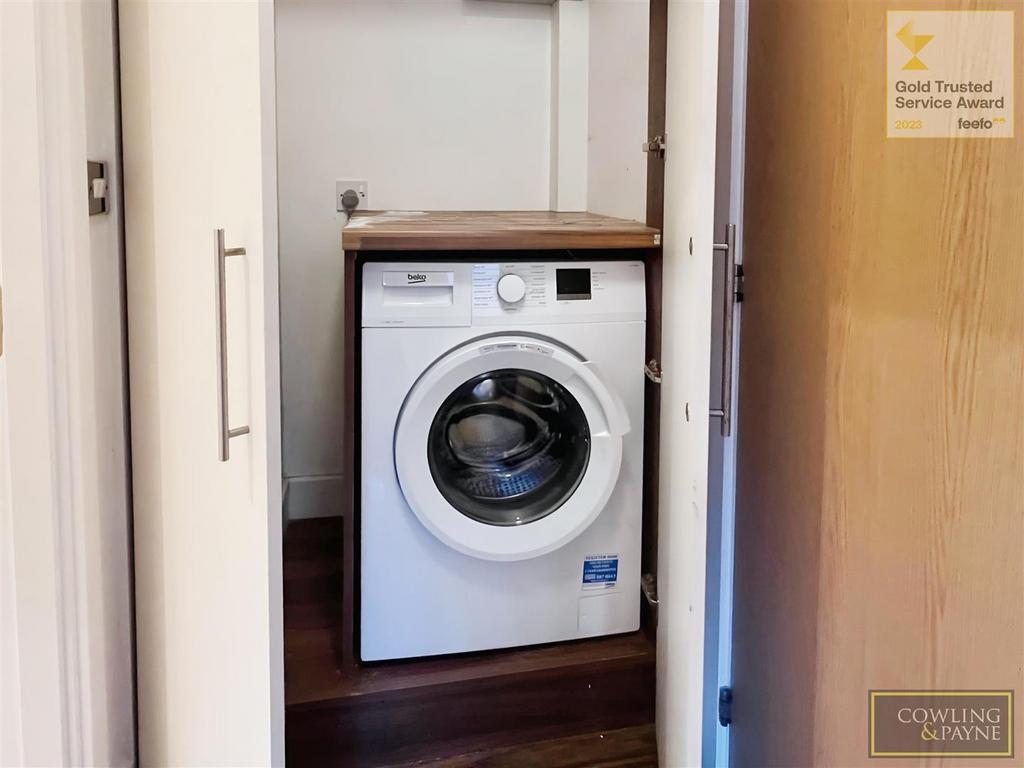 Utility cupboard in hallway