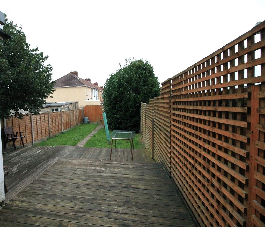 A spacious garden area perfect for outdoor rela...