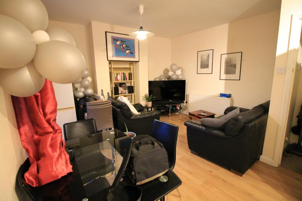 A spacious and inviting large modern living roo...