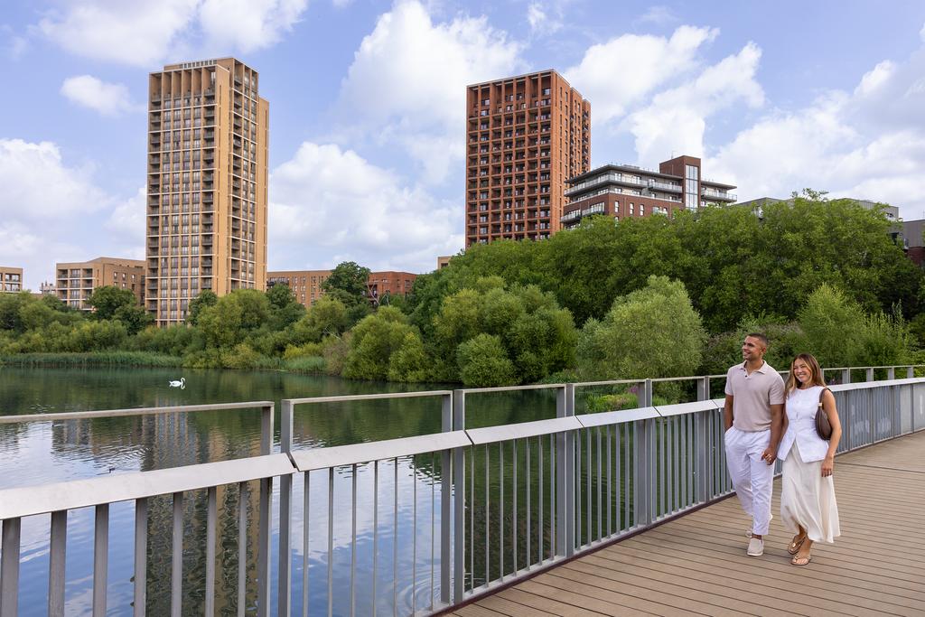 Couple walking on bridge